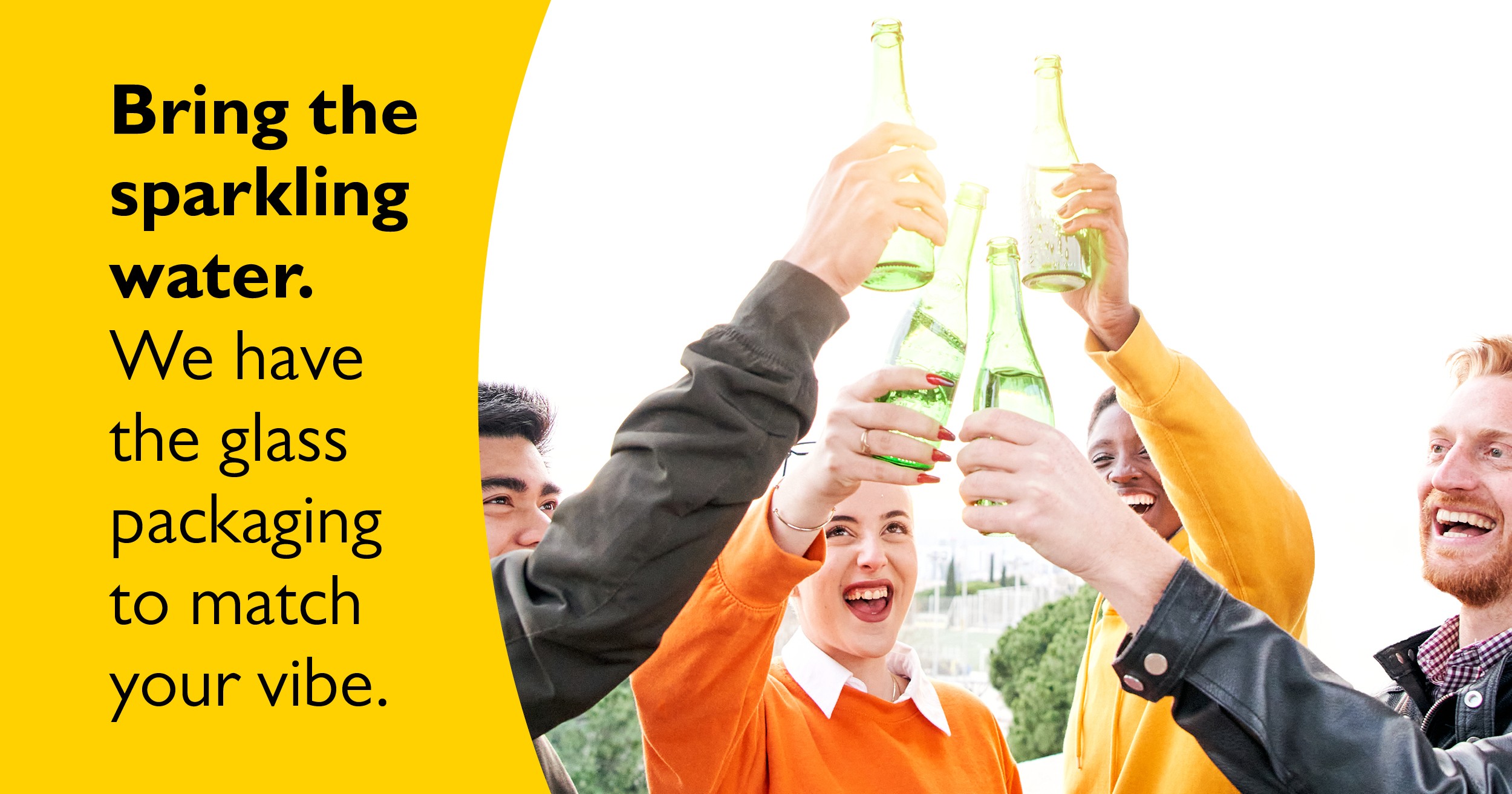 Happy people enjoying sparkling water in glass bottles